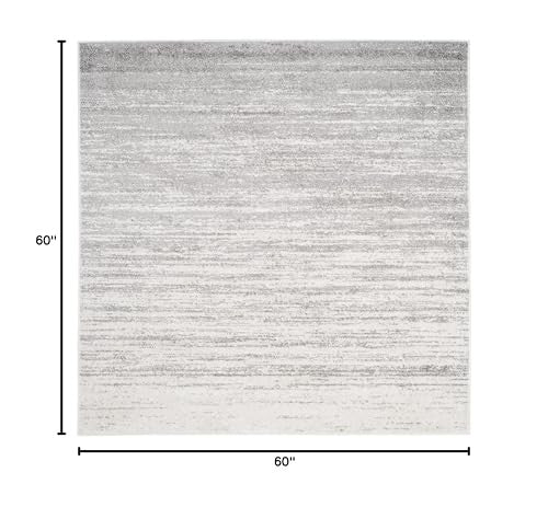Safavieh Adirondack Collection ivory and silver modern ombre area rug with a 5 square foot design, showcasing a subtle gradient pattern.