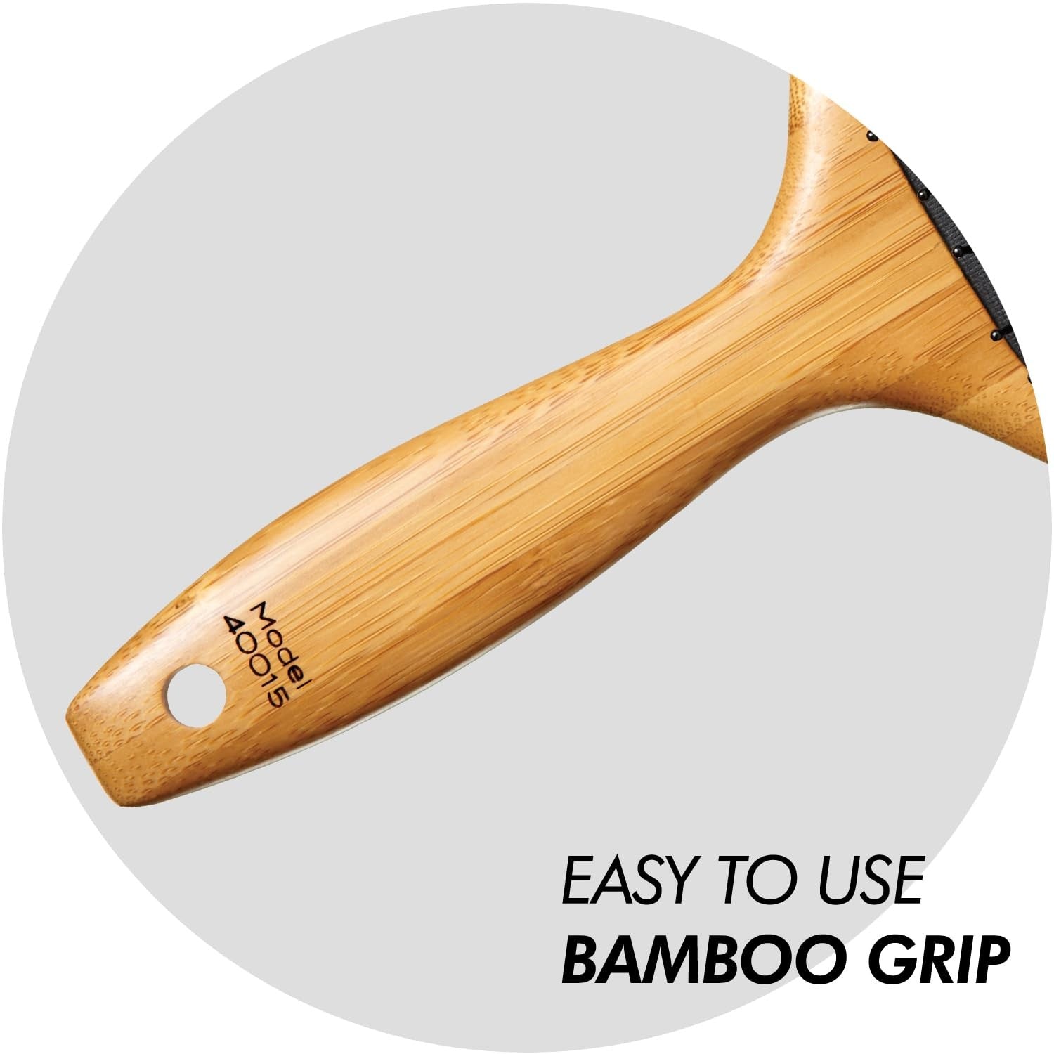 Sam Villa Signature Series bamboo paddle brush for hair styling with wooden handle, ideal for detangling and smoothing hair.