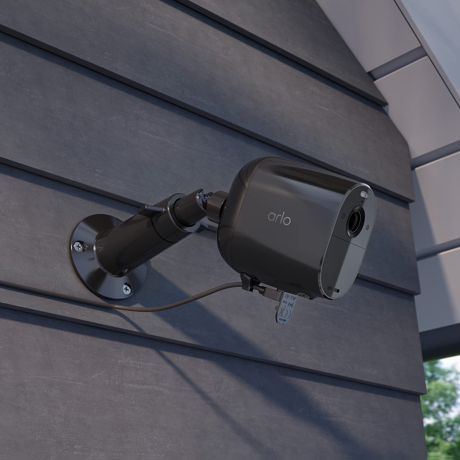 Arlo Essential Outdoor 25 ft. charging cable, a durable accessory for Arlo security cameras, shown coiled with connector ends visible.