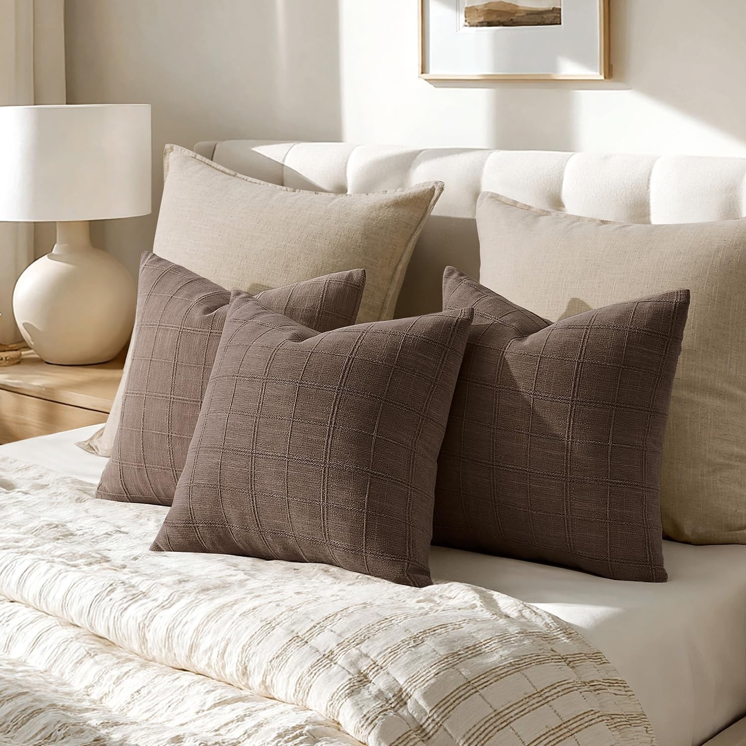 Woaboy linen check throw pillow cover in brown with farmhouse modern boho vintage style, 22x22 inches, featuring a check pattern.