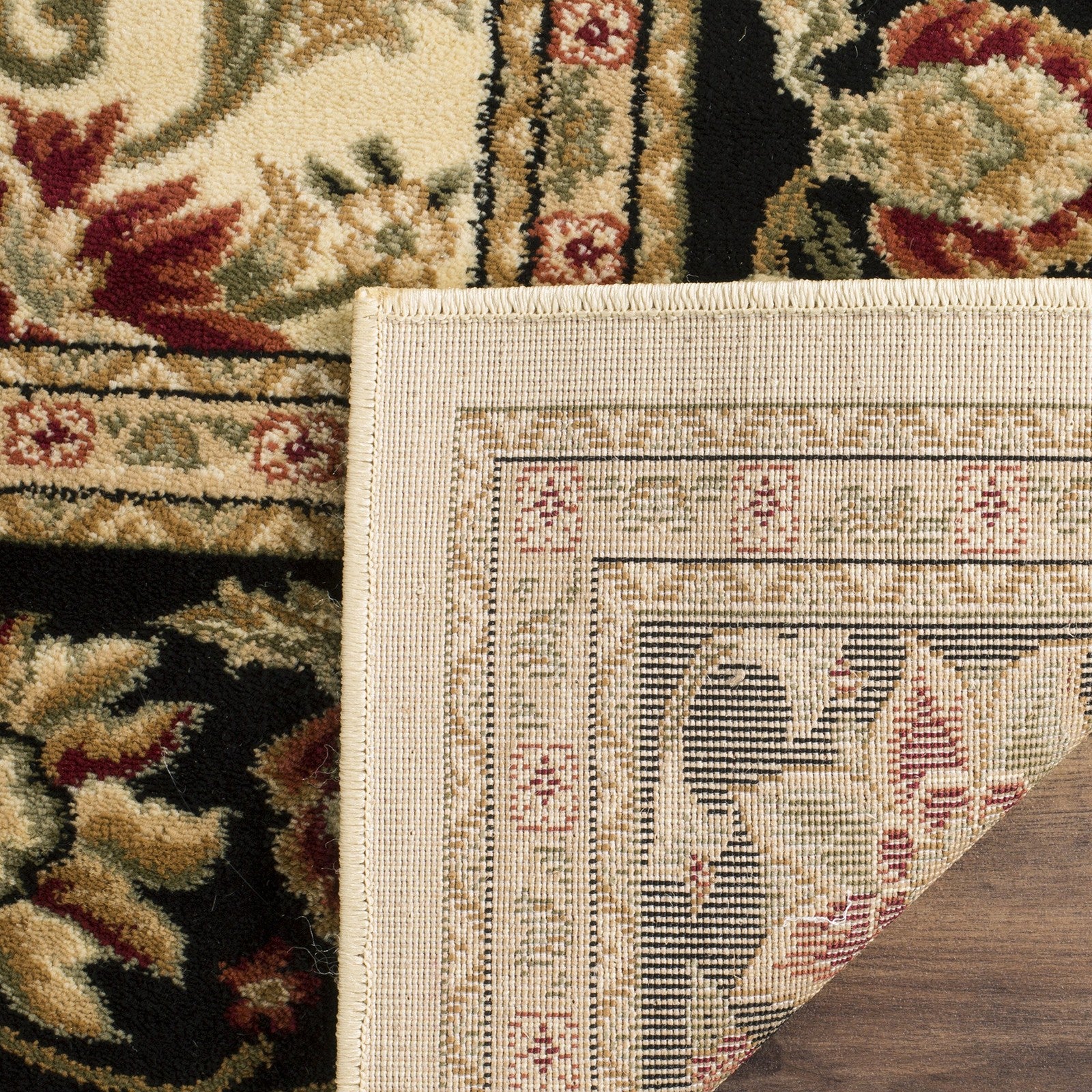 Safavieh Lyndhurst traditional area rug in ivory and black, 8x10 size, with intricate pattern and classic design.