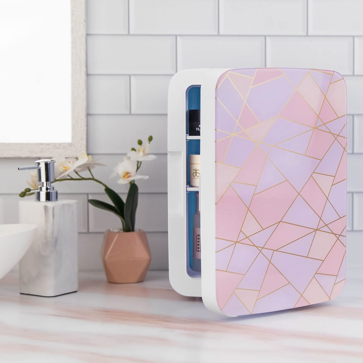 Cooluli 10L mini fridge for bedroom, car, or office, showing compact design with door handle and control panel inside.