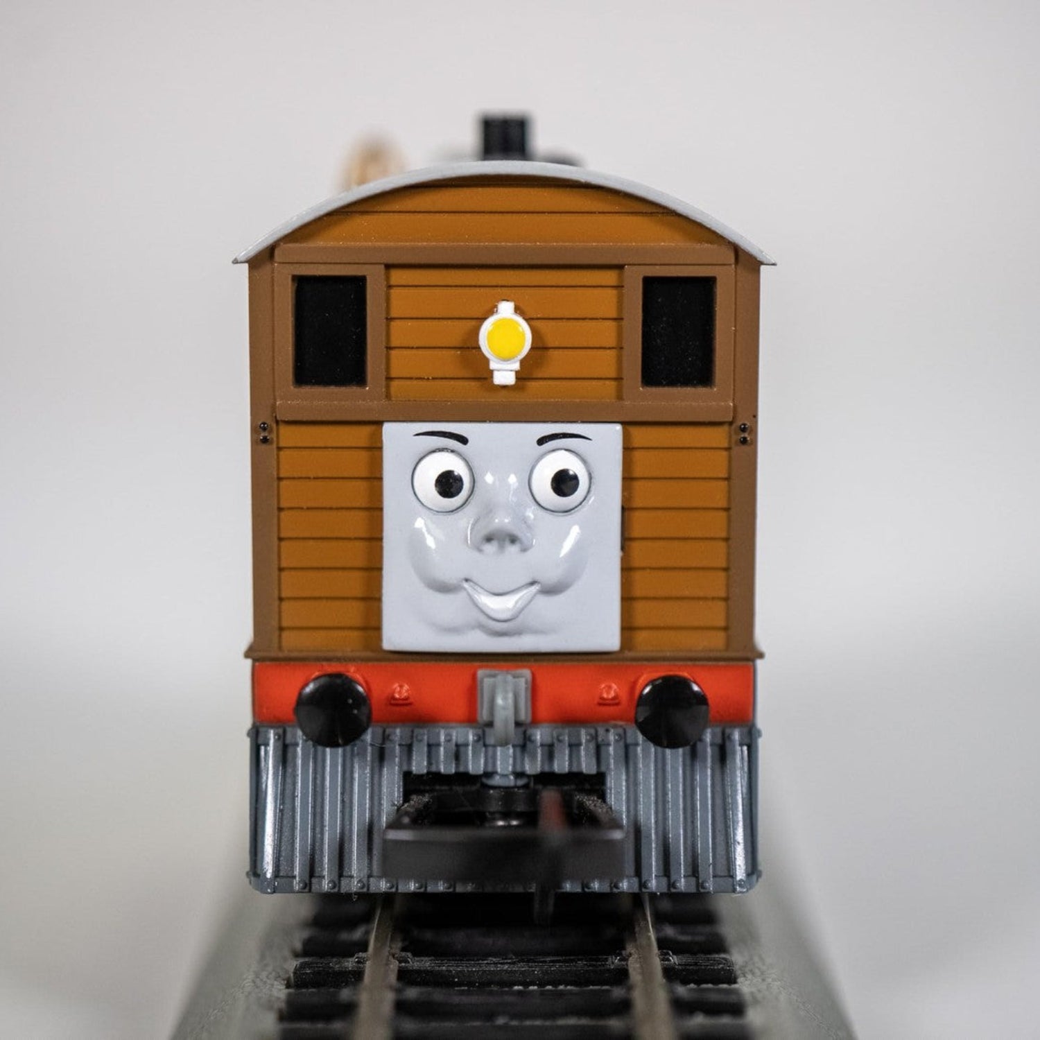Bachmann Trains Thomas and Friends Toby the Tram Engine model with moving eyes, black locomotive, detailed plastic toy train.
