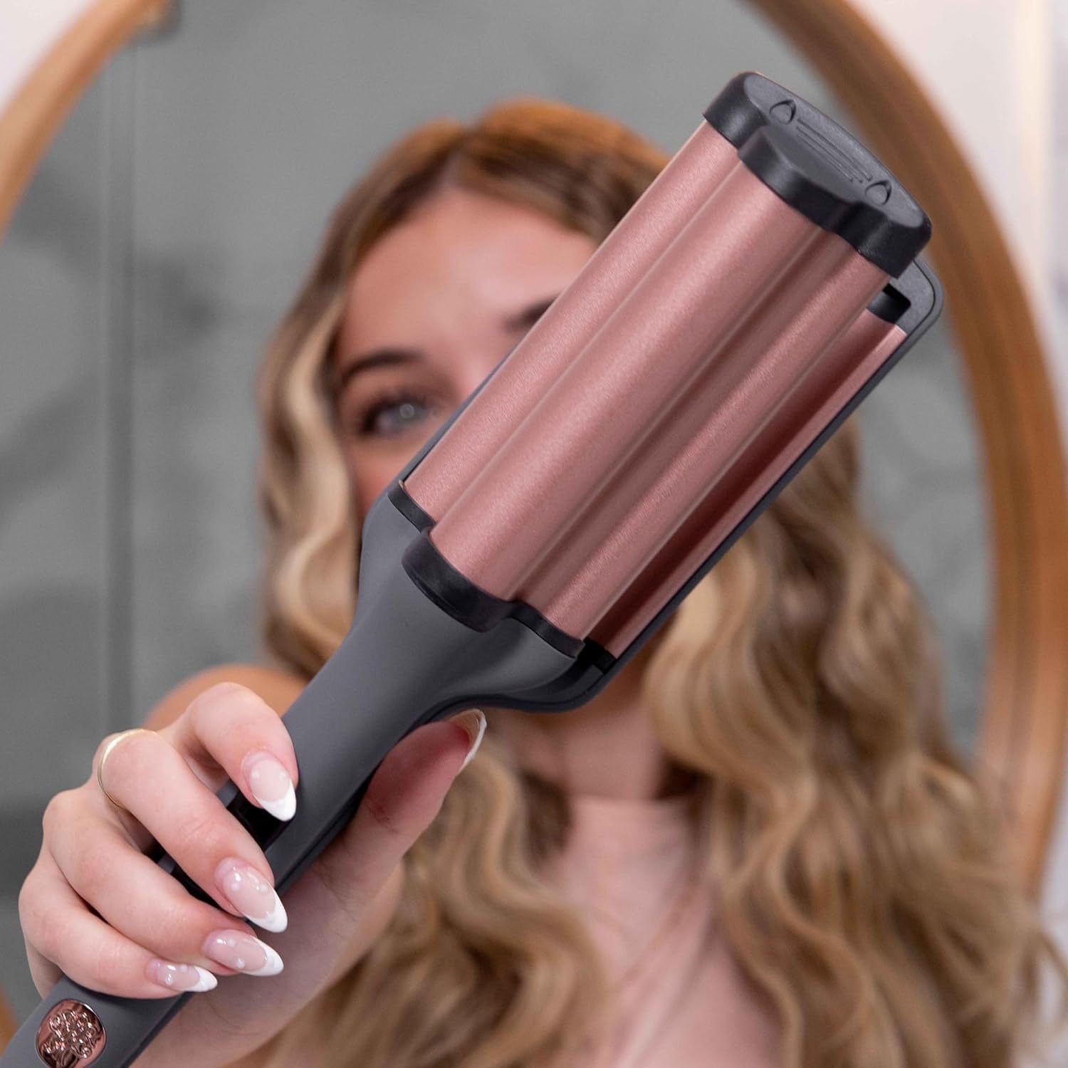 Hairitage 3 barrel curling iron with ceramic tourmaline for beach waves and curls, displayed with its sleek design and heat controls.