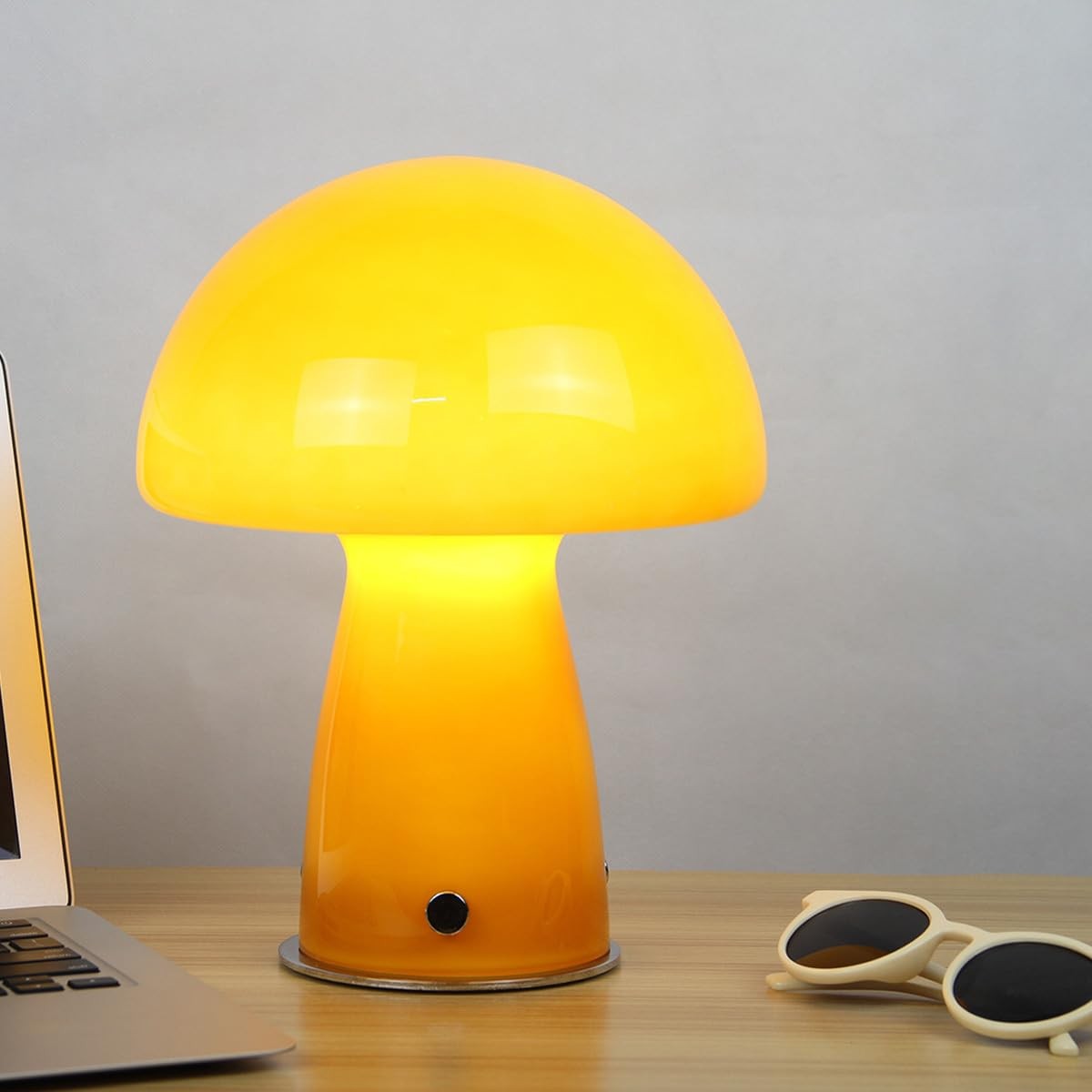 Cute orange mushroom lamp with glass shade by MIXL, small table light emitting warm 3000K glow, perfect for cozy decor.