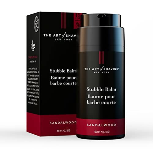 The Art of Shaving Sandalwood Beard Balm in 3.3 oz jar, showing the product with a wooden spoon and a sandalwood plant in the background.
