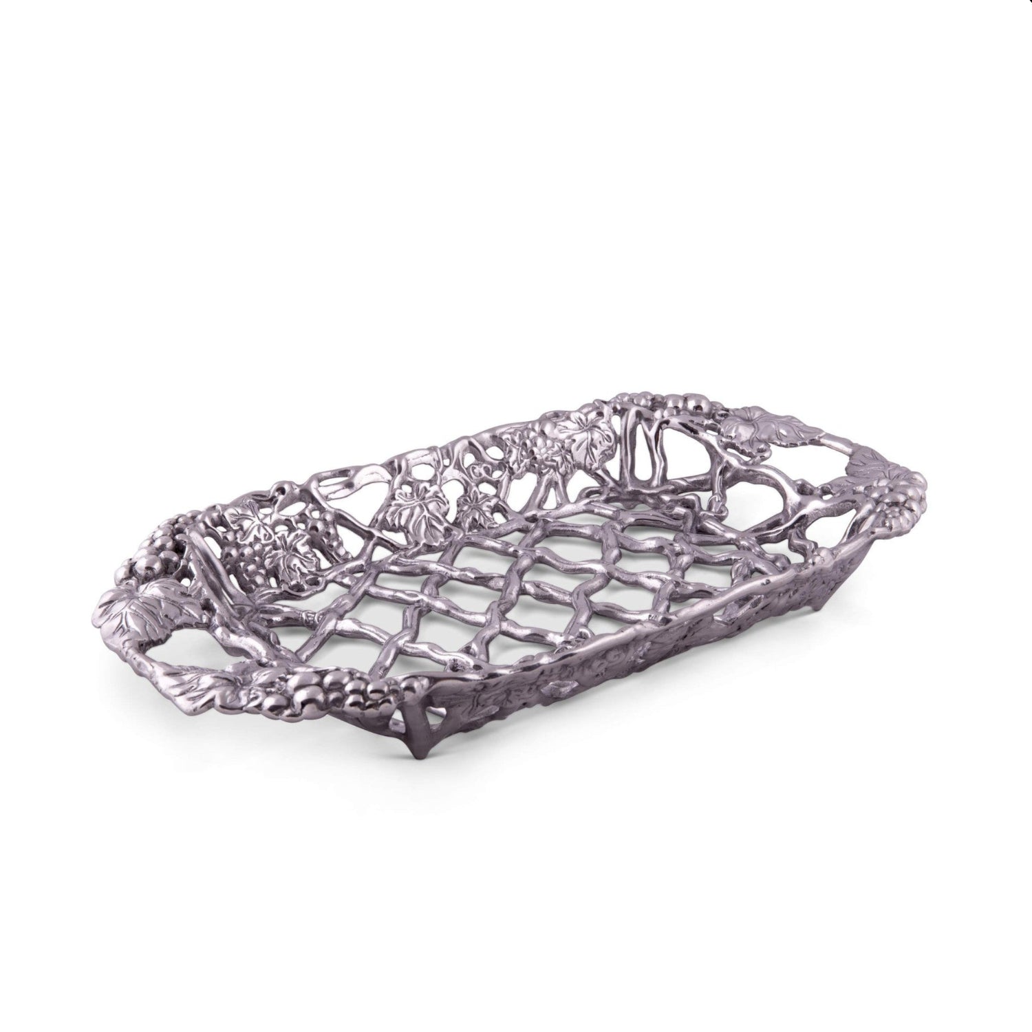 Arthur Court metal Pyrex glass casserole dish holder with grape pattern, sand-casted metal design for secure serving.