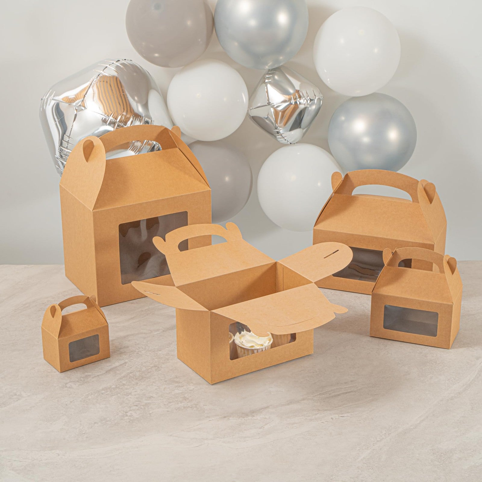 Bio Tek gable boxes for party favors by Restaurantware, 8.5 x 4.8 x 5.5 inches, with 25 attractive gift boxes stacked together.