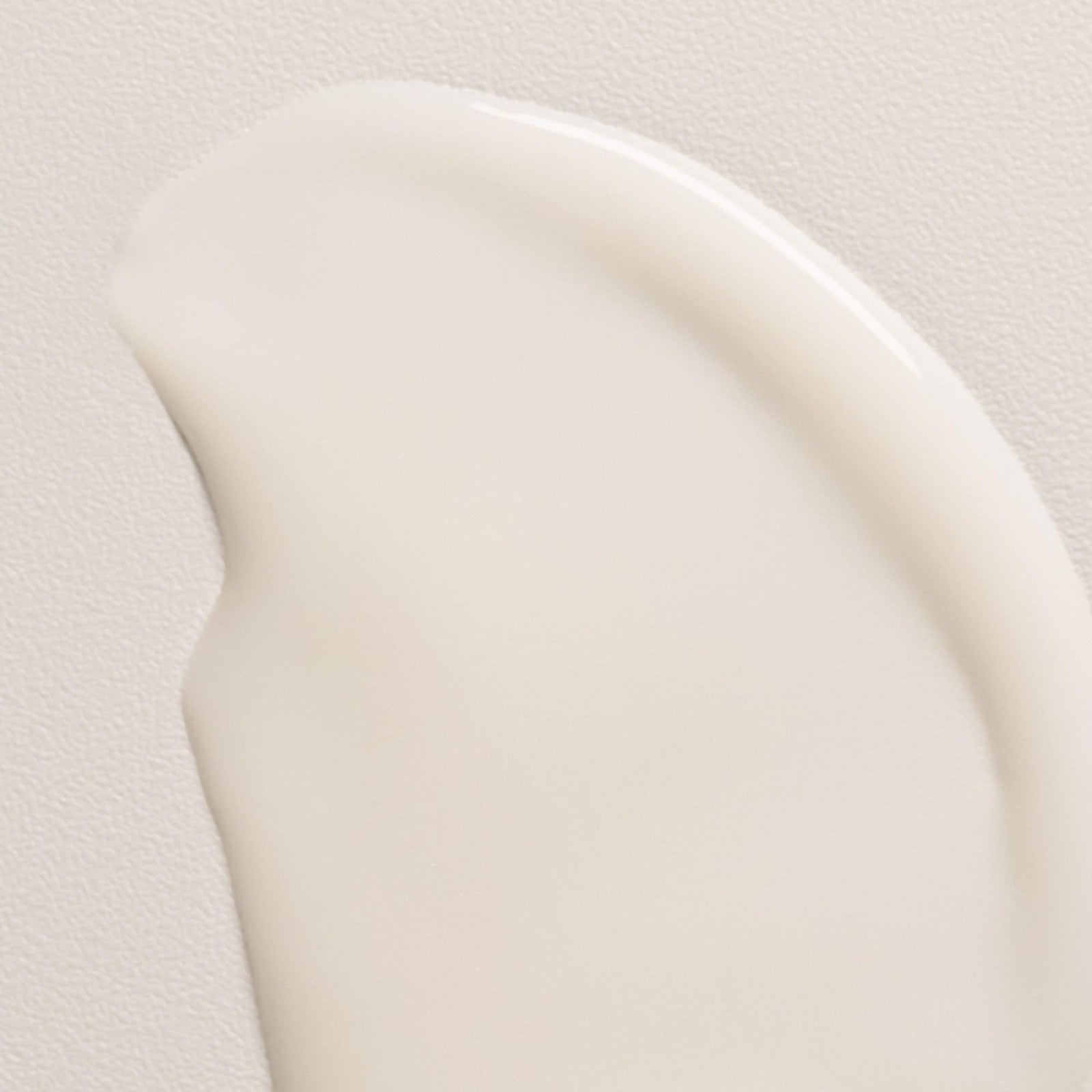 Davines LOVE Curl Cream leave-on serum in a sleek tube, designed to define and enhance curly hair with a weightless formula.
