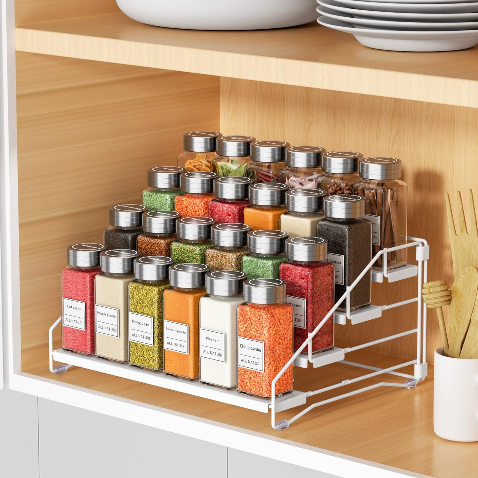 RCHYFEED 4-tier spice rack organizer for cabinet, showcasing neatly arranged spice jars on a kitchen shelf.