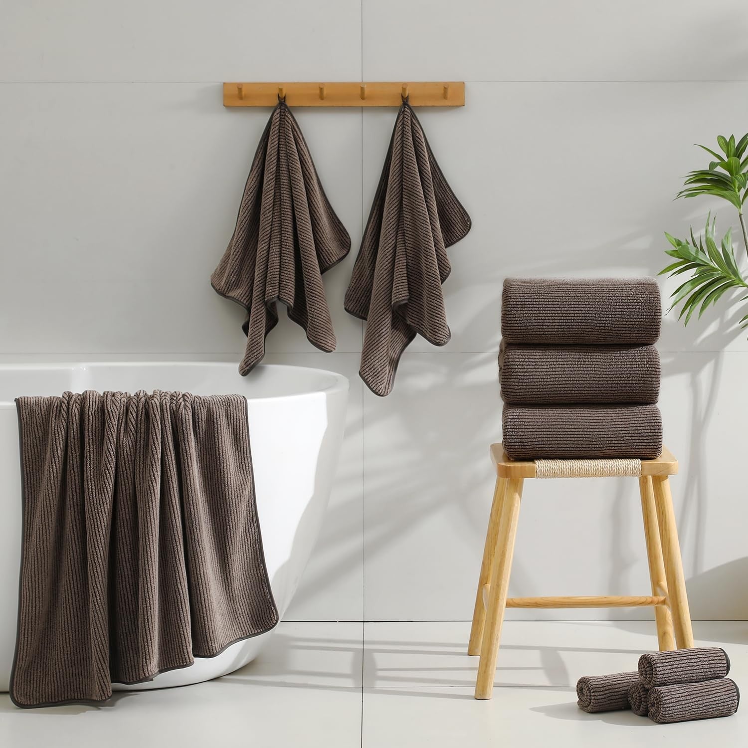 Set of four Jessy Home oversized bath towels, 35x70 inches, ultra-soft, plush, ideal for luxurious bathroom use.