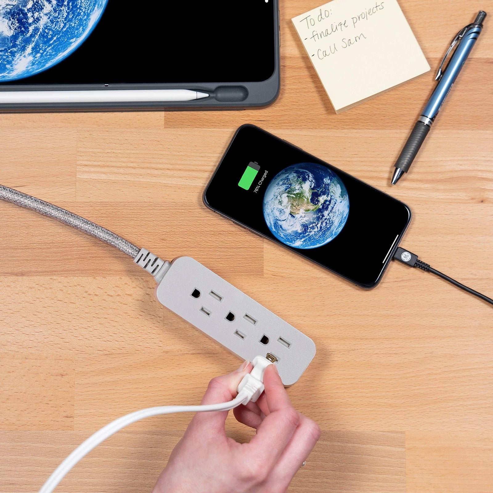 GE Pro 3 Outlet Surge Protector Power Strip with 15 ft braided extension cord in black, featuring multiple outlets and surge protection.