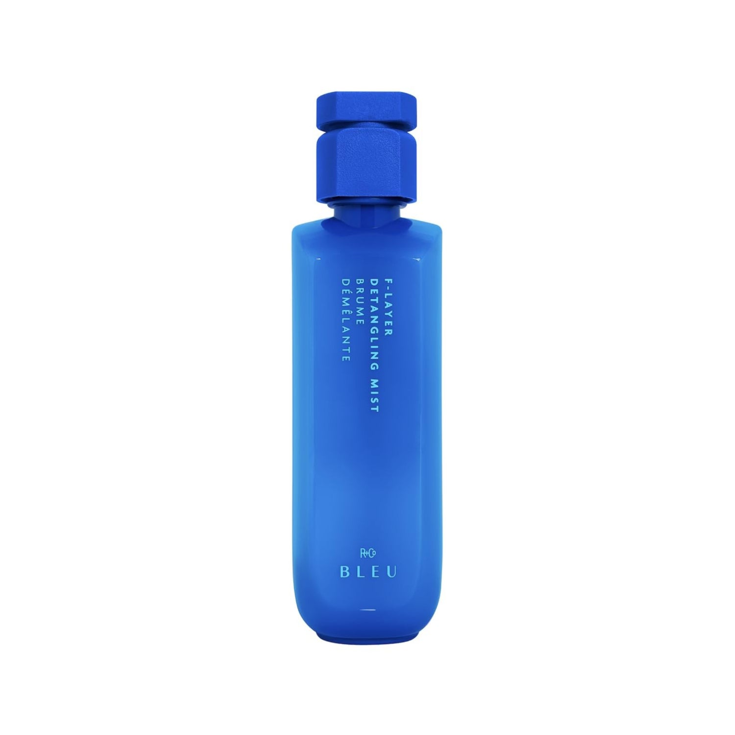 R+Co BLEU F-Layer Detangling Mist spray bottle, 6.8 fl oz, for smooth, manageable hair with lightweight detangling formula.