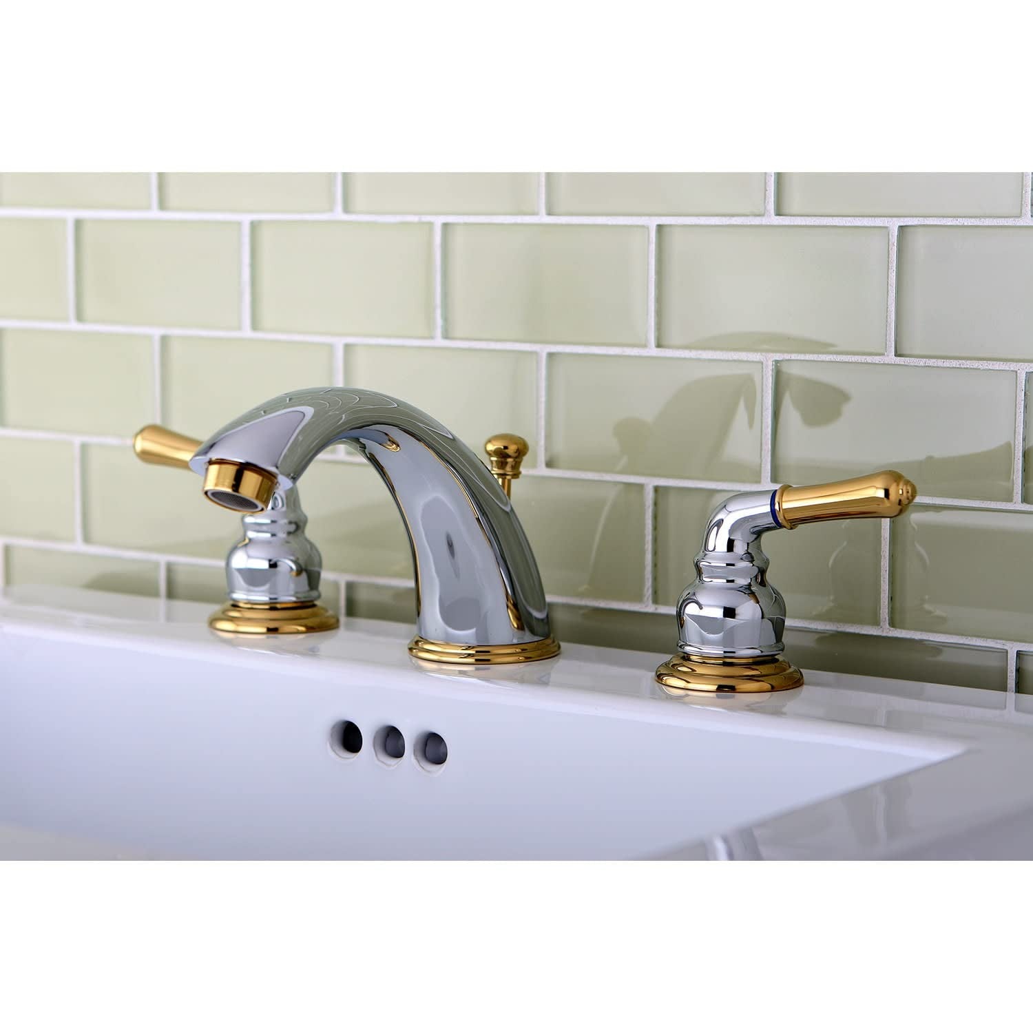 Kingston Brass Magellan widespread bathroom faucet with polished finish and retail pop-up drain, featuring modern design.