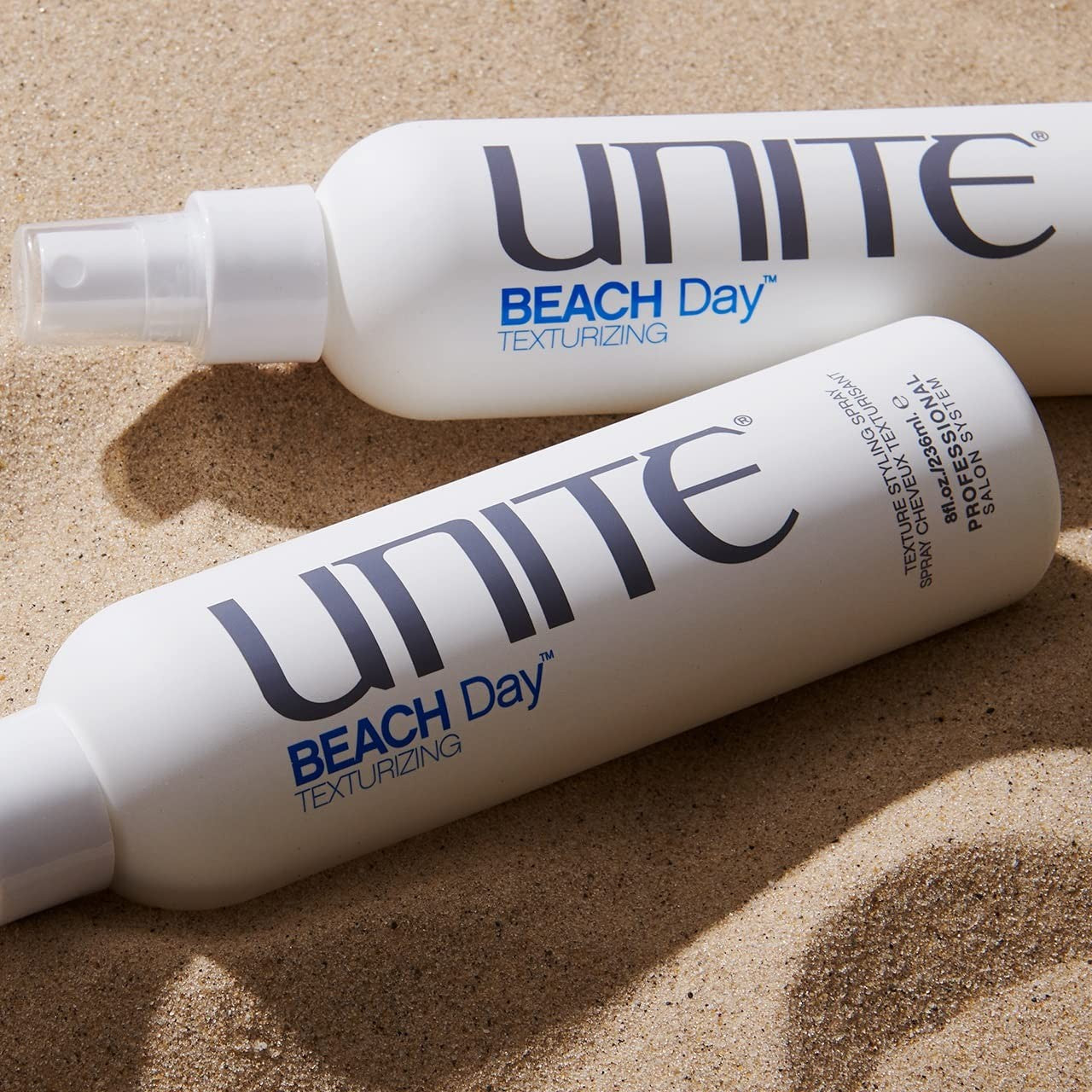 UNITE Beach Day Sea Salt Spray for tousled, textured hair with added thickness, natural finish, and beachy style.