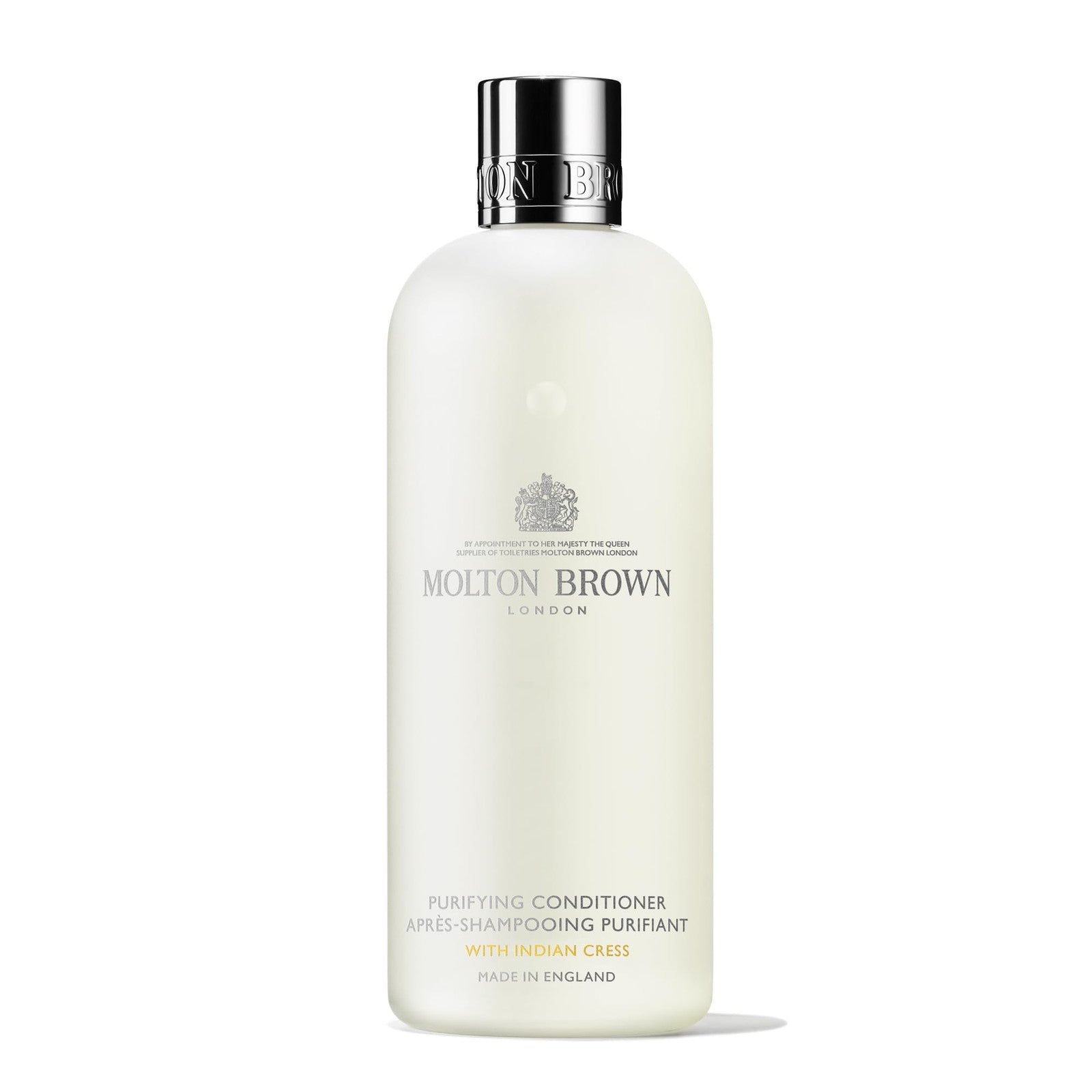 Molton Brown Purifying Conditioner with Indian Cress in a 10 fl oz bottle, creamy texture and elegant packaging.