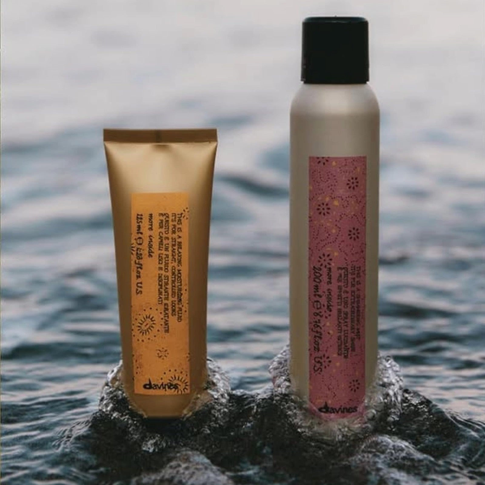 Davines This is a Relaxing Moisturizing Fluid with heat protection and frizz control, shown in a sleek bottle on a white background.