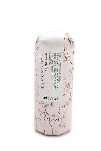 Davines This is a Texturizing Serum bottle with a pump dispenser, showcasing the workable formula for creating body and structure in hair.