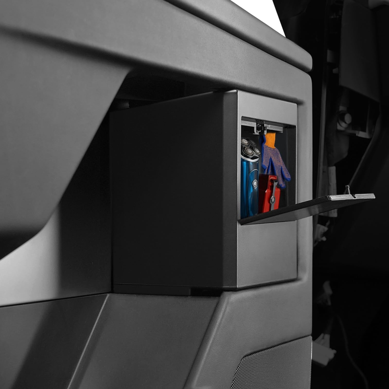 Foronetry hidden storage box installed inside Tesla Cybertruck door, built-in compartment for secure storage, 2024-2026 model.