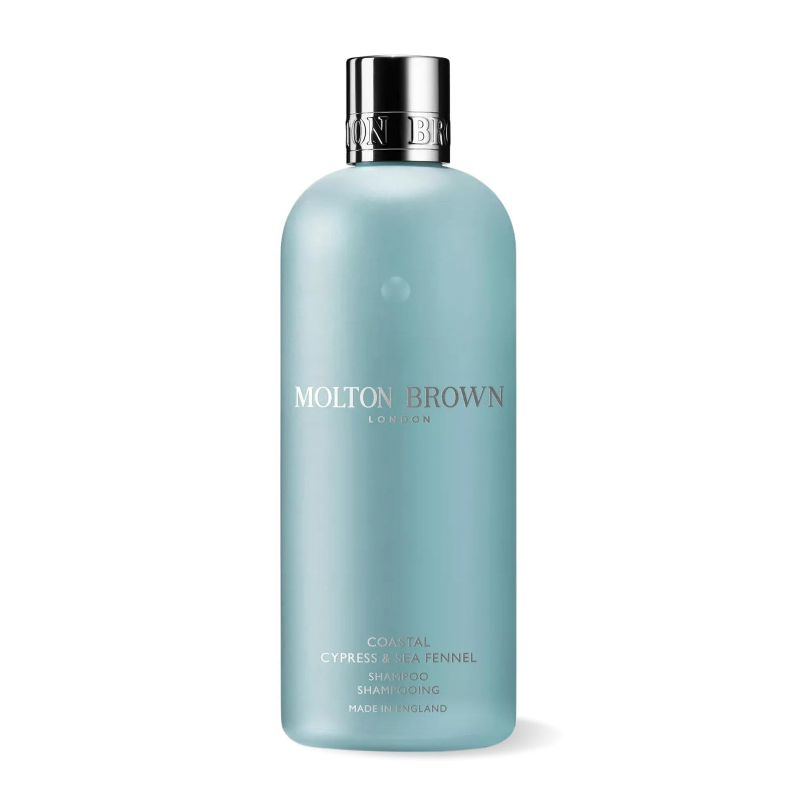 Molton Brown Coastal Cypress & Sea Fennel Shampoo bottle with a sleek design and label featuring coastal and botanical imagery.