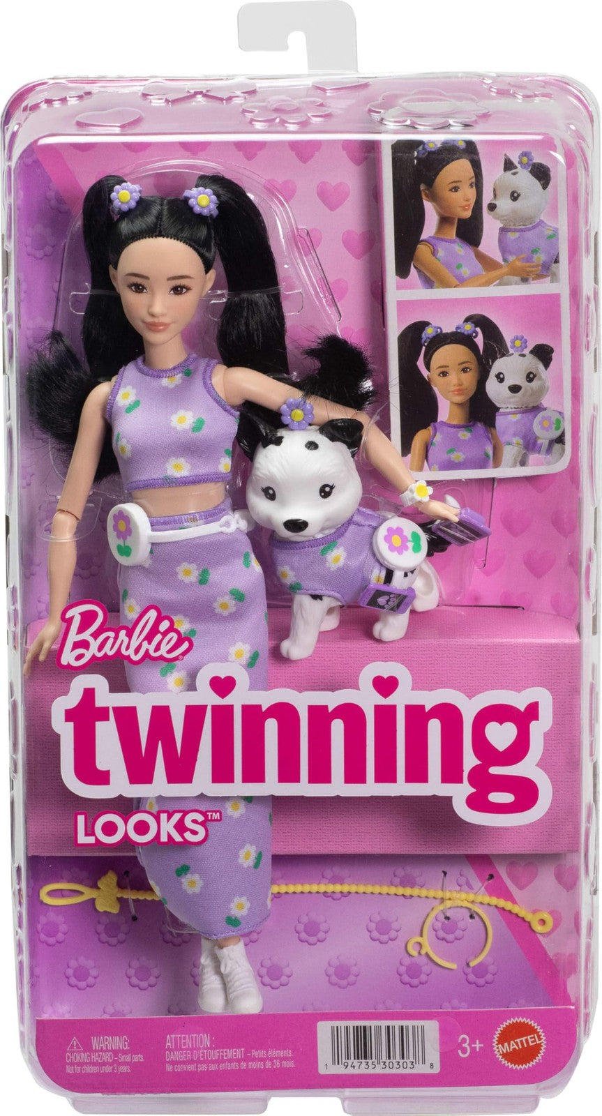 Barbie Twinning Looks Doll and pet dog in matching purple daisy outfits, showcasing coordinated fashion and accessories.