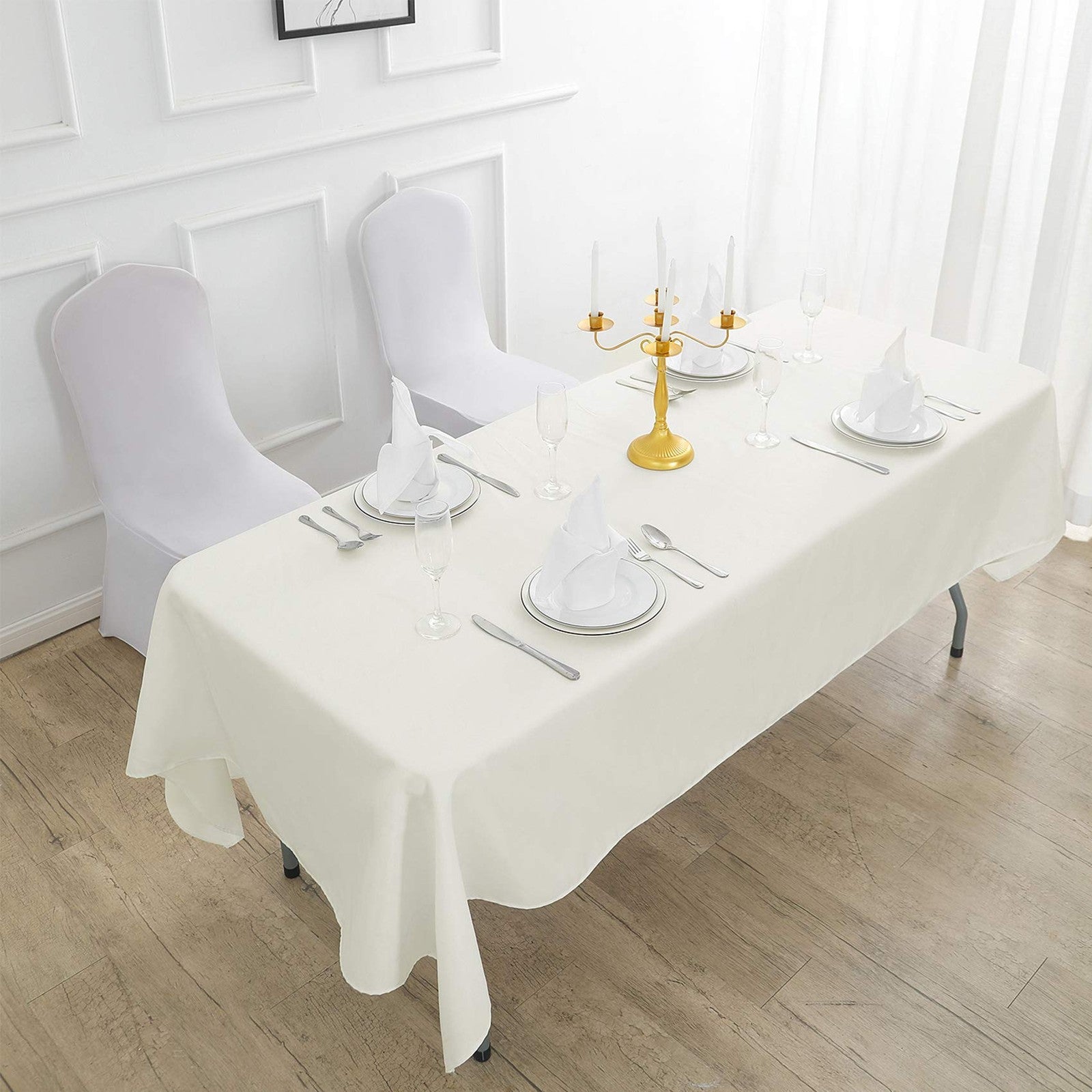Rectangular polyester tablecloth measuring 60x120 inches, washable fabric, suitable for dining tables, unbranded.