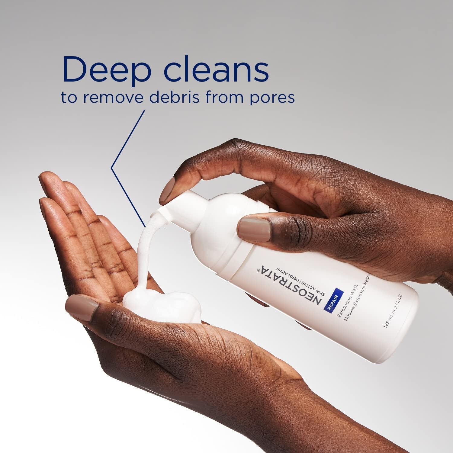 NEOSTRATA Exfoliating Wash Revitalizing Foaming Facial Cleanser with Polyhydroxy, showing the white foaming cleanser in a clear bottle