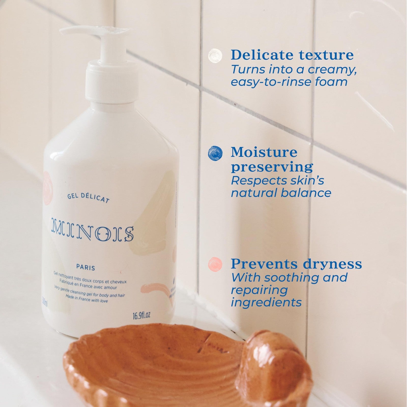 MINOIS PARIS baby wash and shampoo with orange, gentle body and hair cleanser for infants, in a soft pink bottle with a pump.
