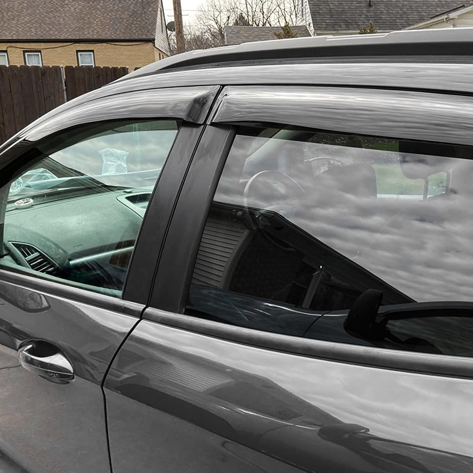 TECHPICCO rain guards for Ford Ranger 2024-2026 side windows, tape-on deflectors, providing weather protection and airflow.