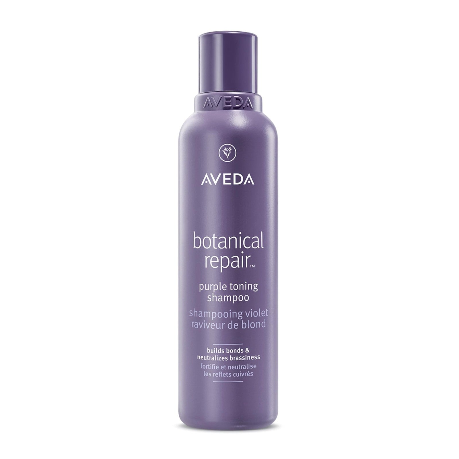 Aveda Botanical Repair Purple Toning Shampoo bottle for blonde, silver, and grey hair on a white background.