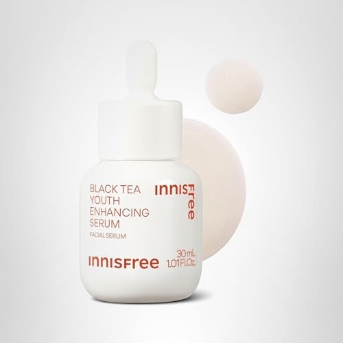 Innisfree Black Tea Youth Serum bottle with label, Korean anti-aging serum containing niacinamide in a sleek pump bottle.