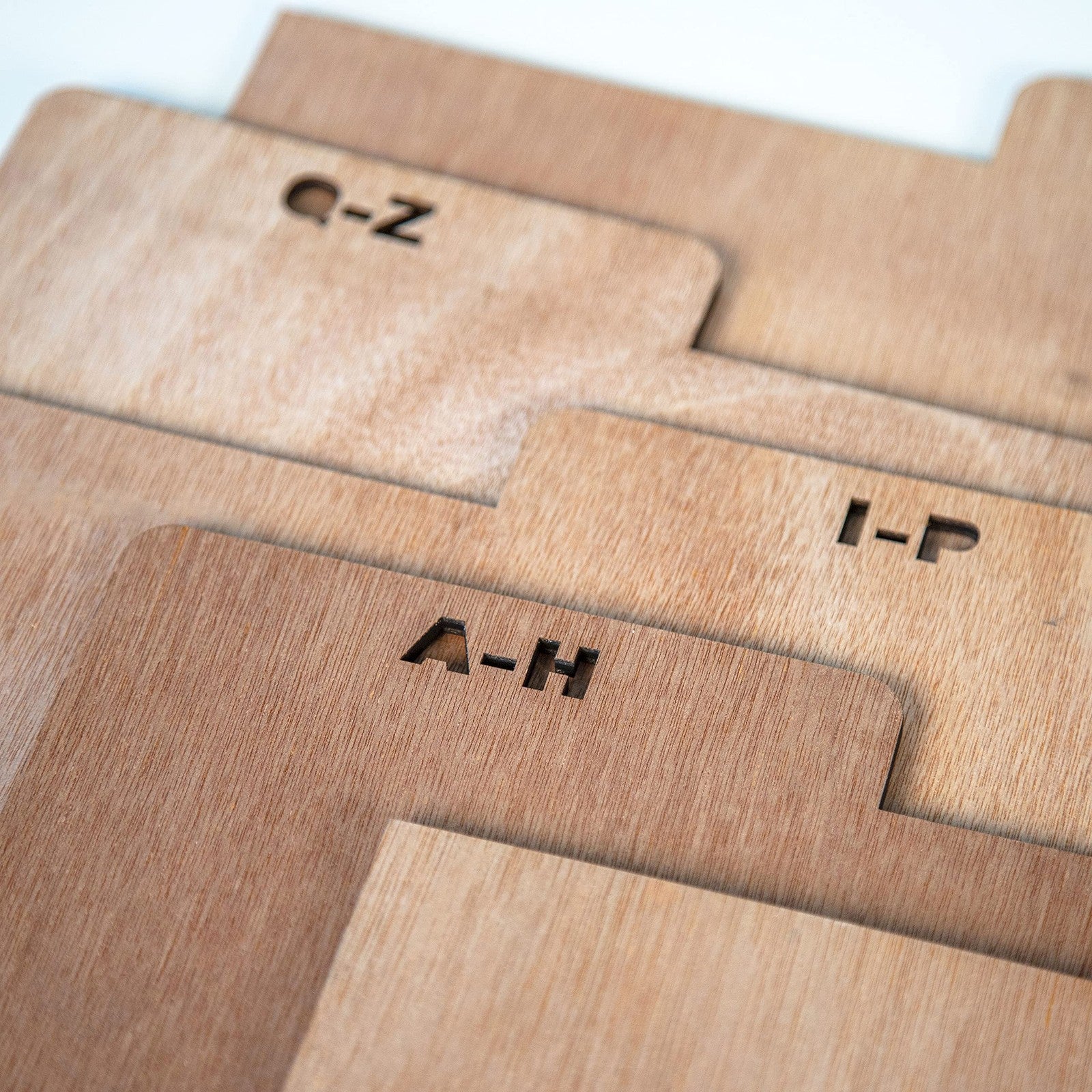Crosley A-Z Wooden Crate Dividers set of 5 in natural wood, designed to organize and separate items within crates.