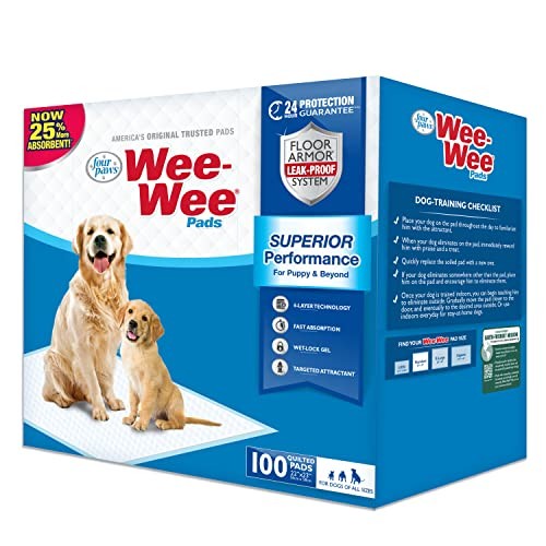 Four Paws Wee-Wee unscented dog pee pads laid flat, designed for puppies and dogs, with absorbent surface and waterproof backing.