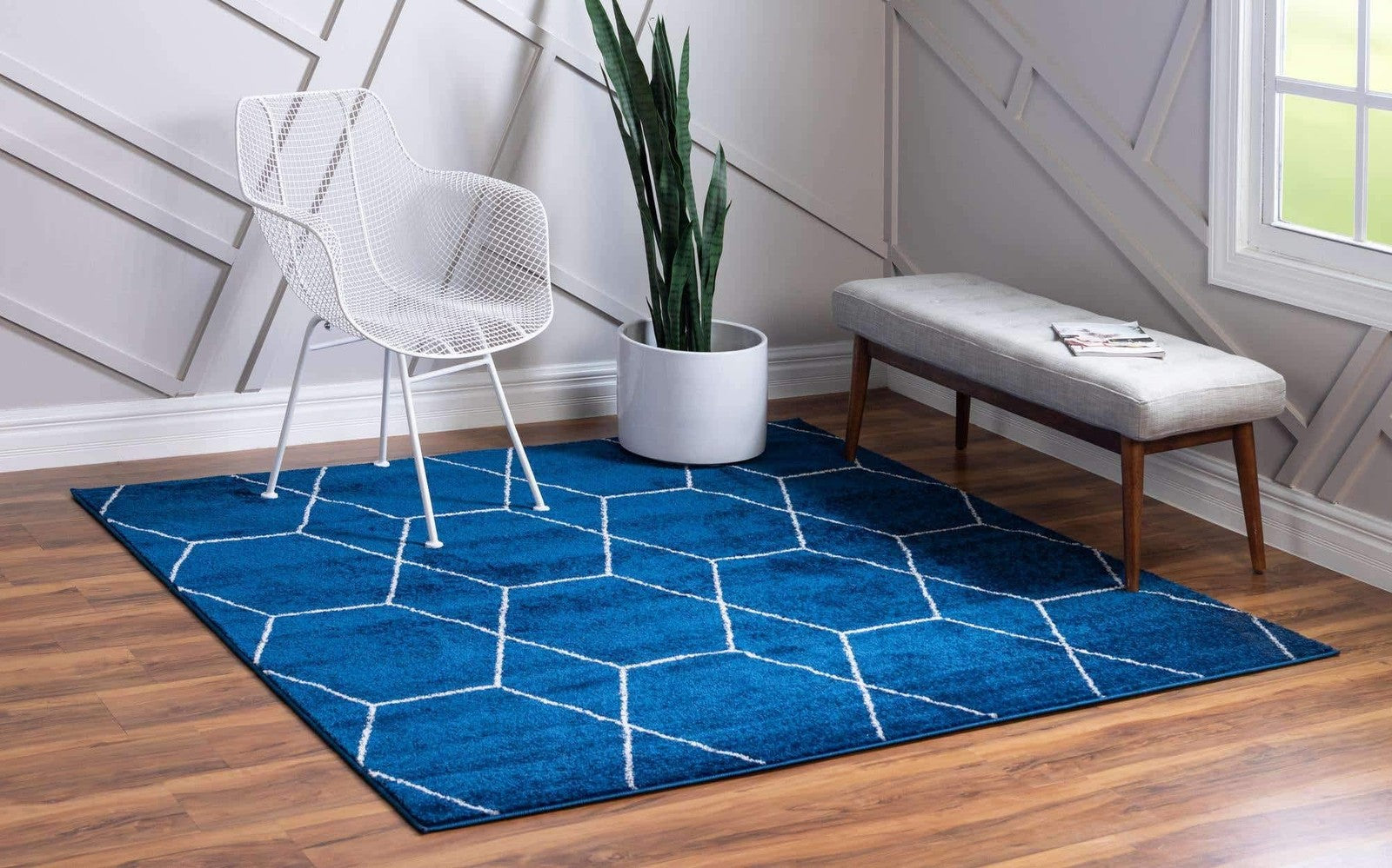 Navy blue geometric area rug from the Unique Loom Trellis Frieze Collection featuring intricate patterns and a soft, plush texture.