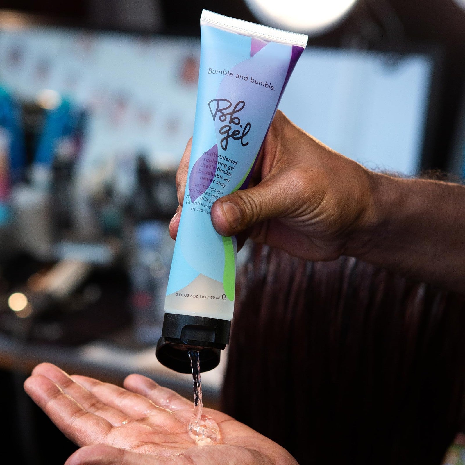 Bumble and bumble hair gel with sculpting, flexible hold, shine, for curly and wavy hairstyles, shown in a jar with product texture.