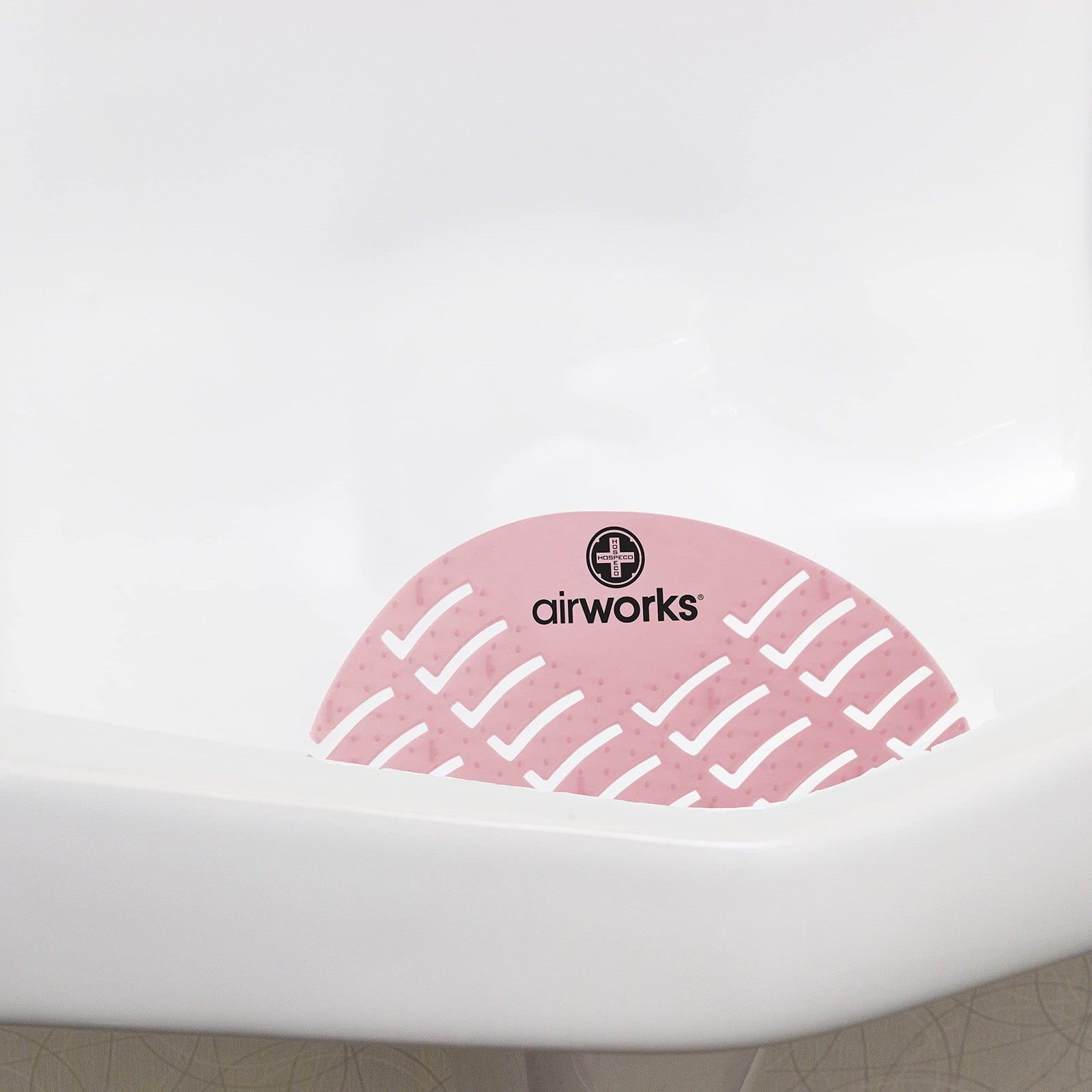 Set of 10 Hospeco Airworks Awus004-Bx urinal deodorizer screens in strawberry red with fresh floral design.