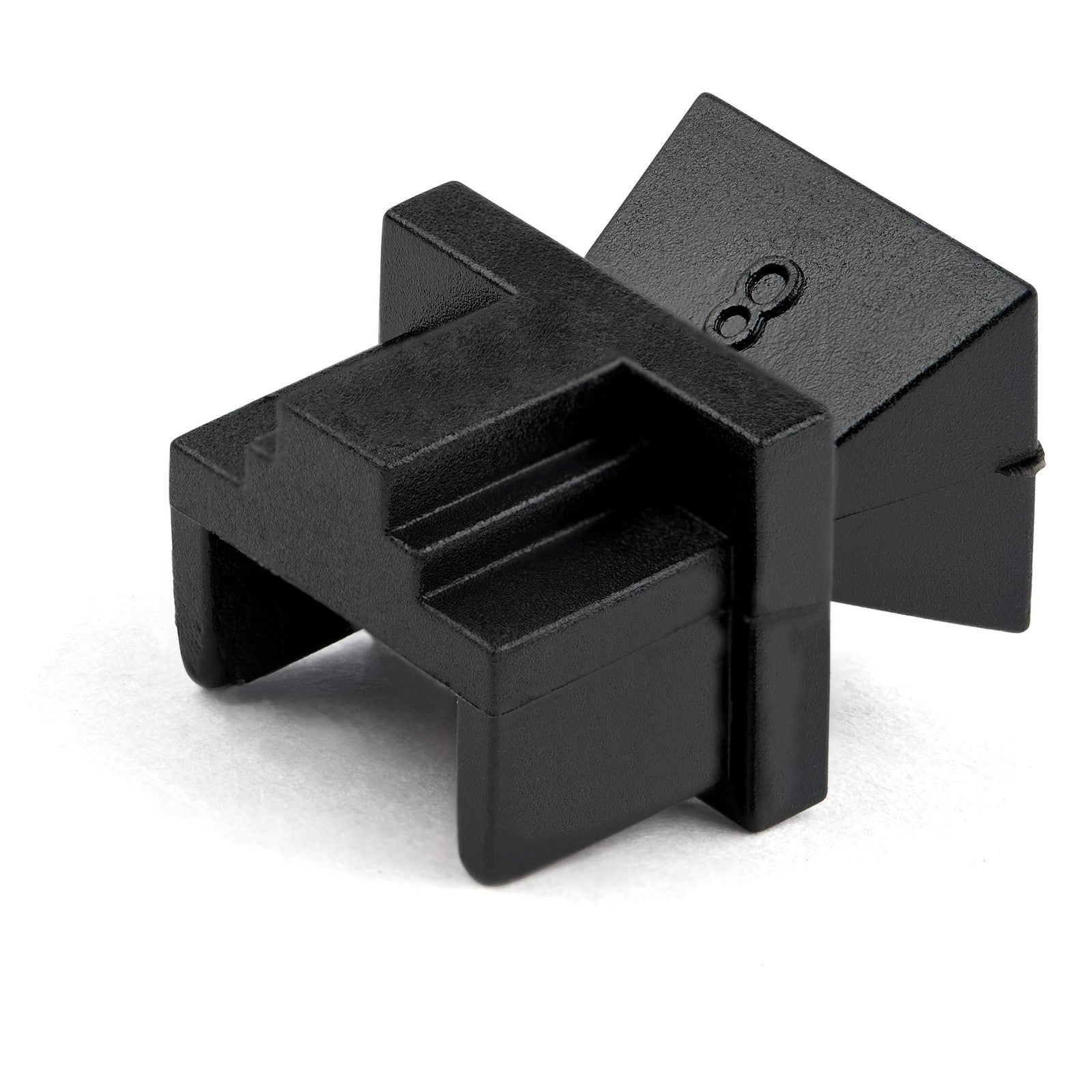 StarTech.com 100-pack RJ45 dust covers and blanking plugs for Ethernet ports, reusable plastic caps on a white background.