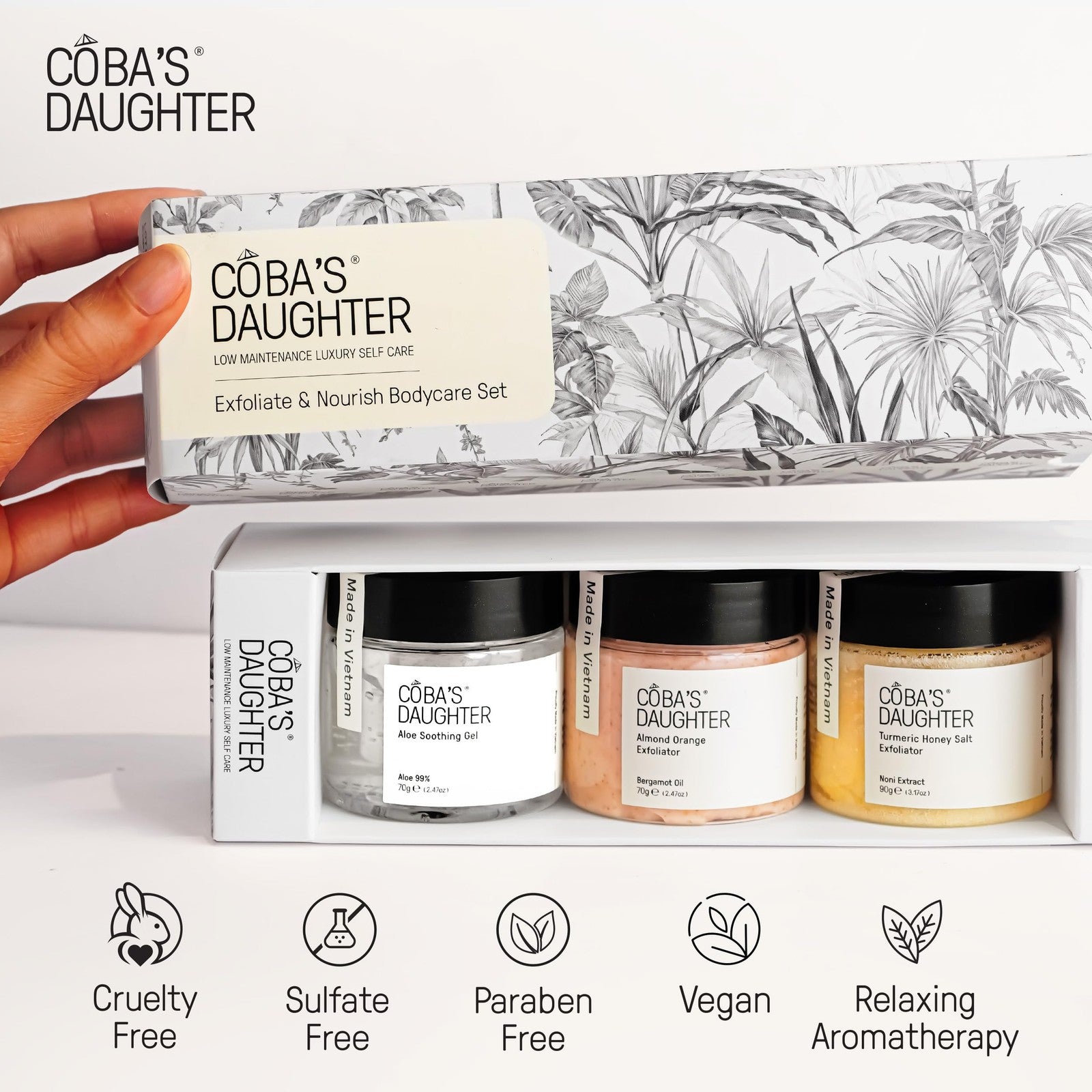 COBA'S DAUGHTER luxury spa gift set for women featuring three mini body care products in elegant packaging.