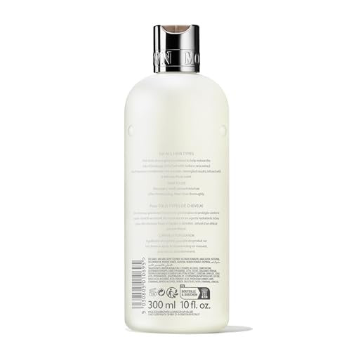 Molton Brown Purifying Conditioner with Indian Cress in a 10 fl oz bottle, showing the conditioner and product label.