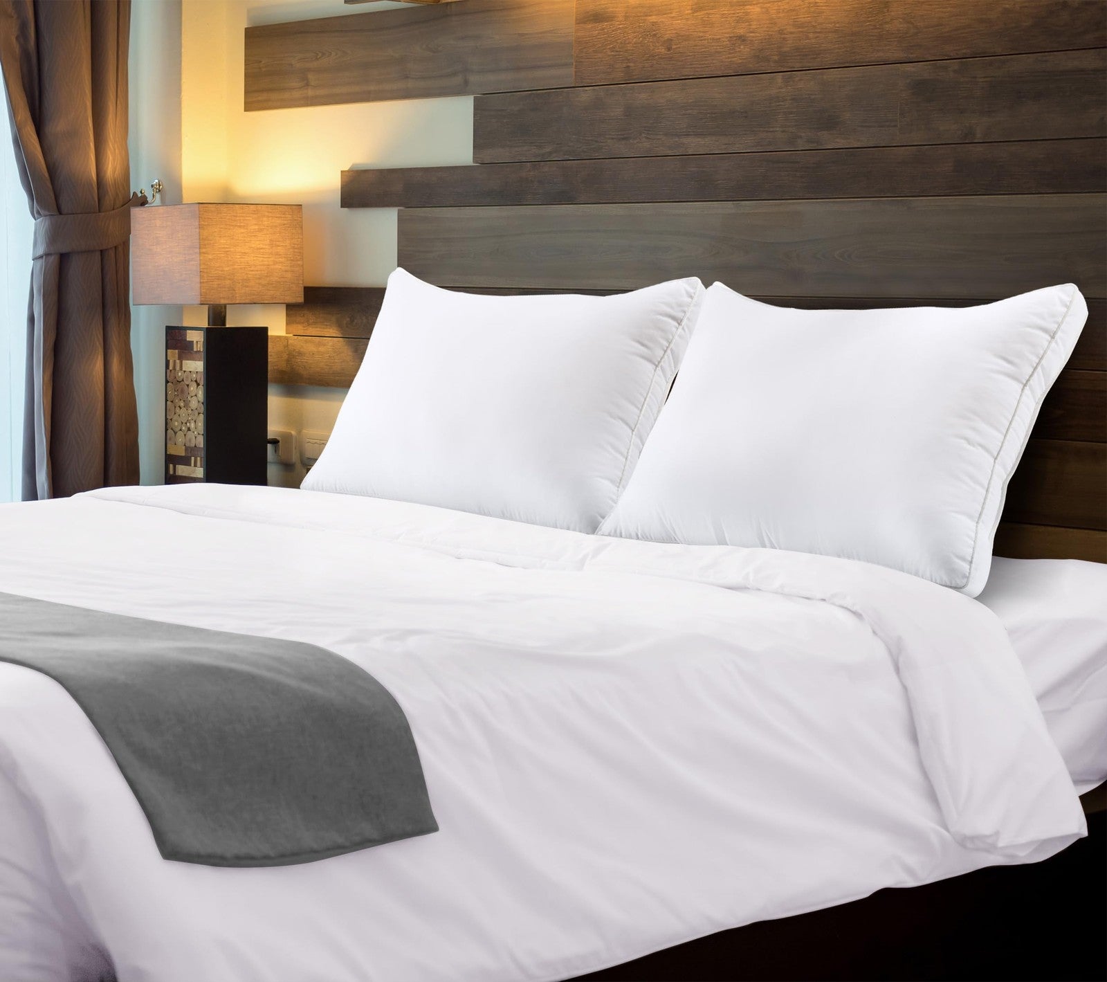 Set of two Utopia Bedding king size white bed pillows, soft and fluffy for comfortable sleeping.