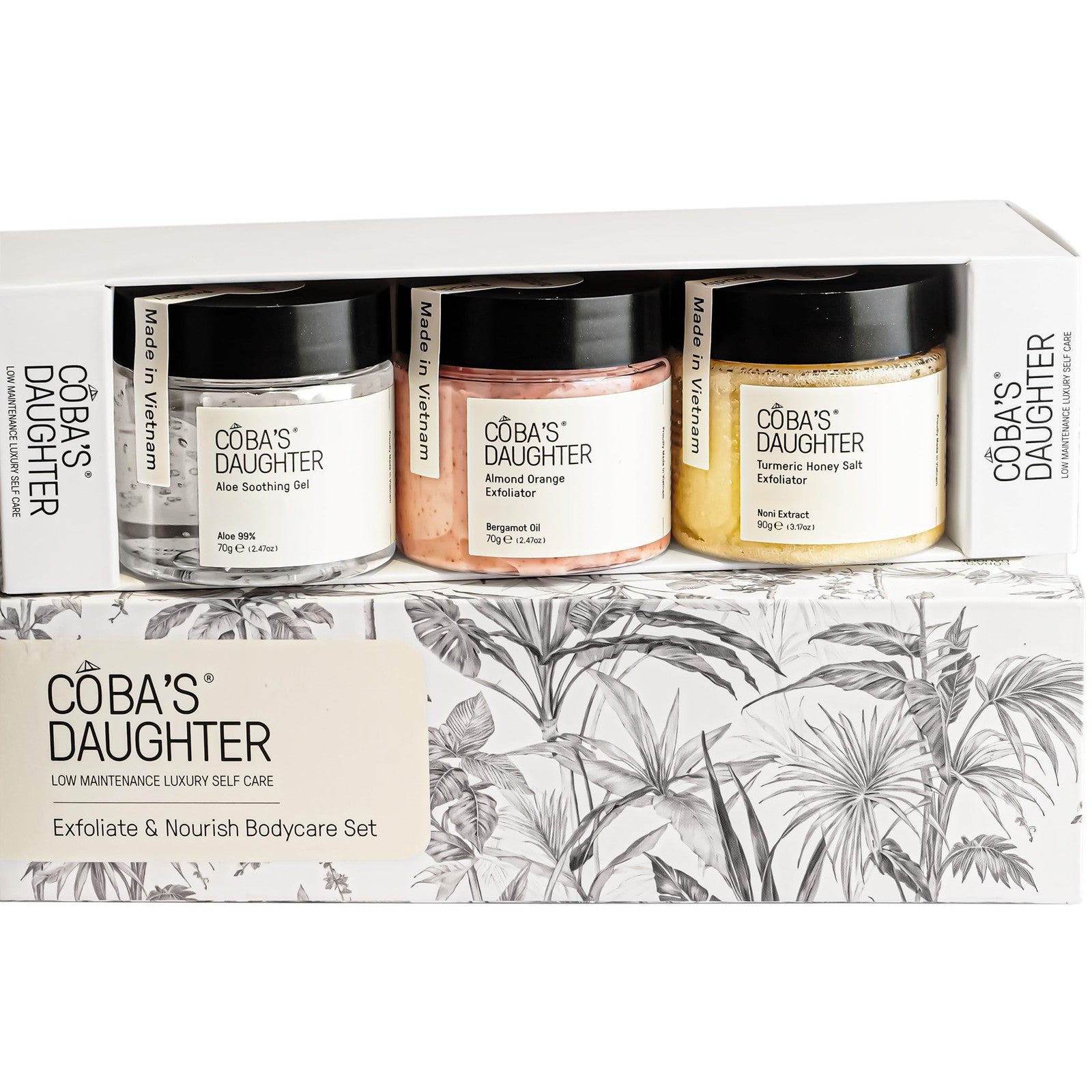 COBA'S DAUGHTER luxury spa gift set for women featuring three mini body care products on a white background.