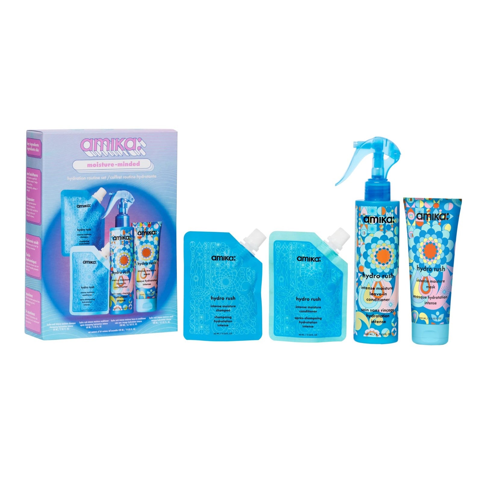 Amika Moisture-Minded Hydration Routine Set with shampoo, conditioner, and treatments for dry hair, TSA travel-sized bottles.