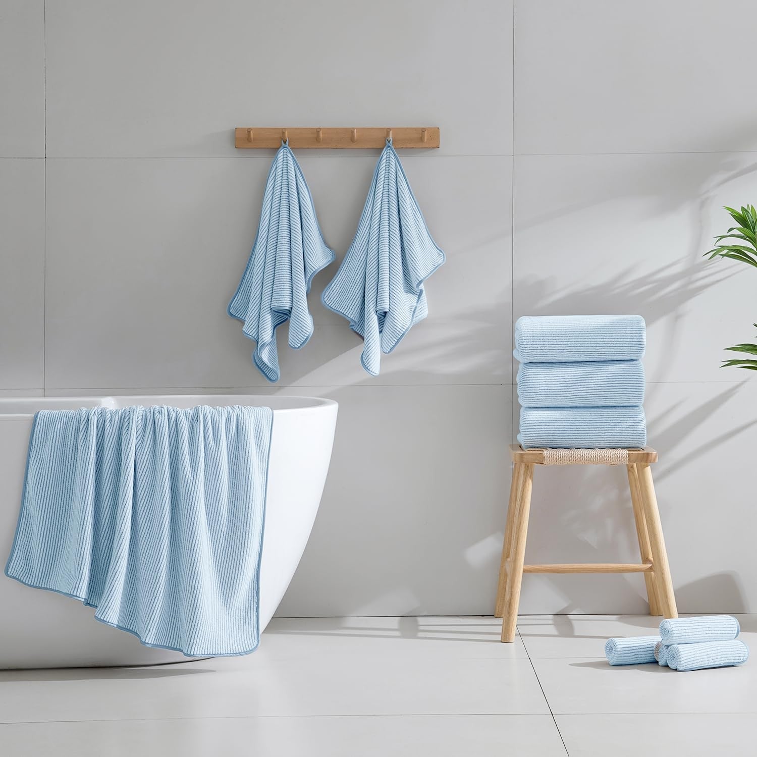 Jessy Home 4-piece oversized bath towel set in soft, plush fabric, measuring 35x70 inches, perfect for luxurious bathroom use.