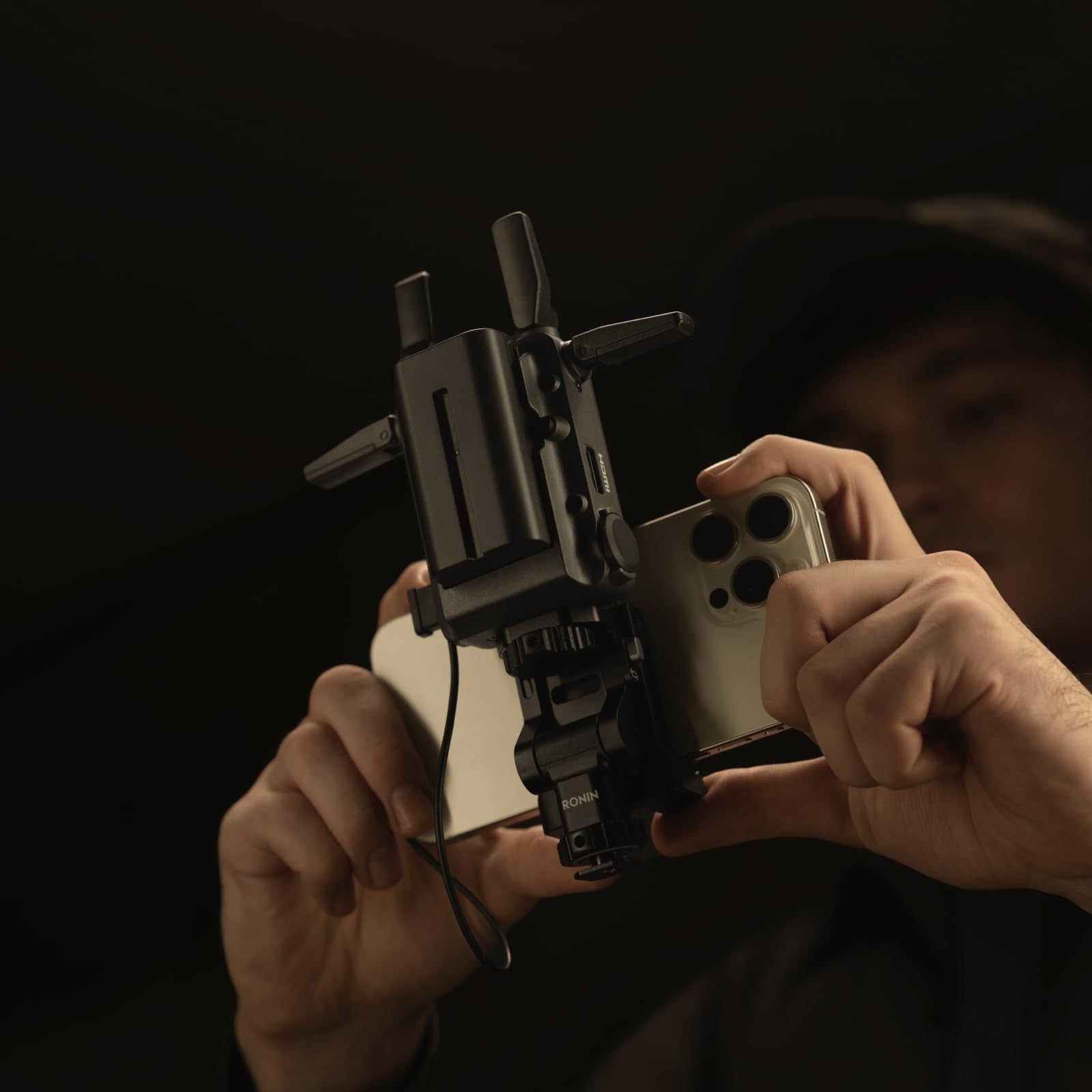 DJI SDR transmission phone holder kit with adjustable clamp and mounting bracket for secure smartphone support.