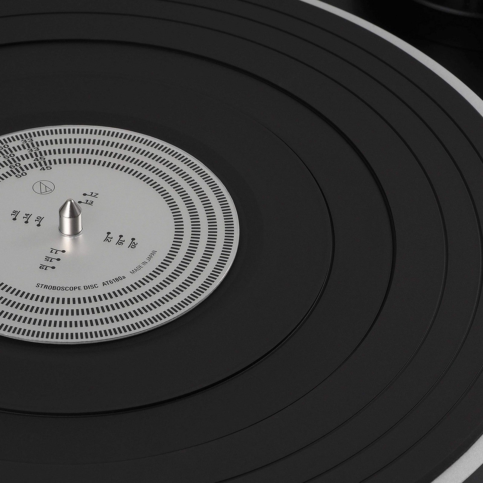 Audio-Technica AT6180a stroboscope disc with detailed markings, used for accurate rotation speed measurement and synchronization.