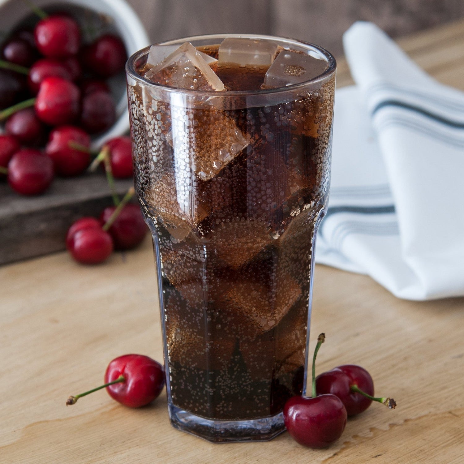 Carlisle FoodService Products Louis tall tumbler for restaurant and catering use, clear plastic with a smooth, cylindrical shape