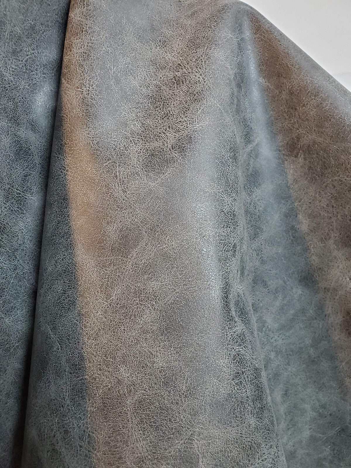 Gray distressed two-tone oily faux vegan leather purse by NAT LEATHERS, showing the textured, stylish exterior with natural light reflections.