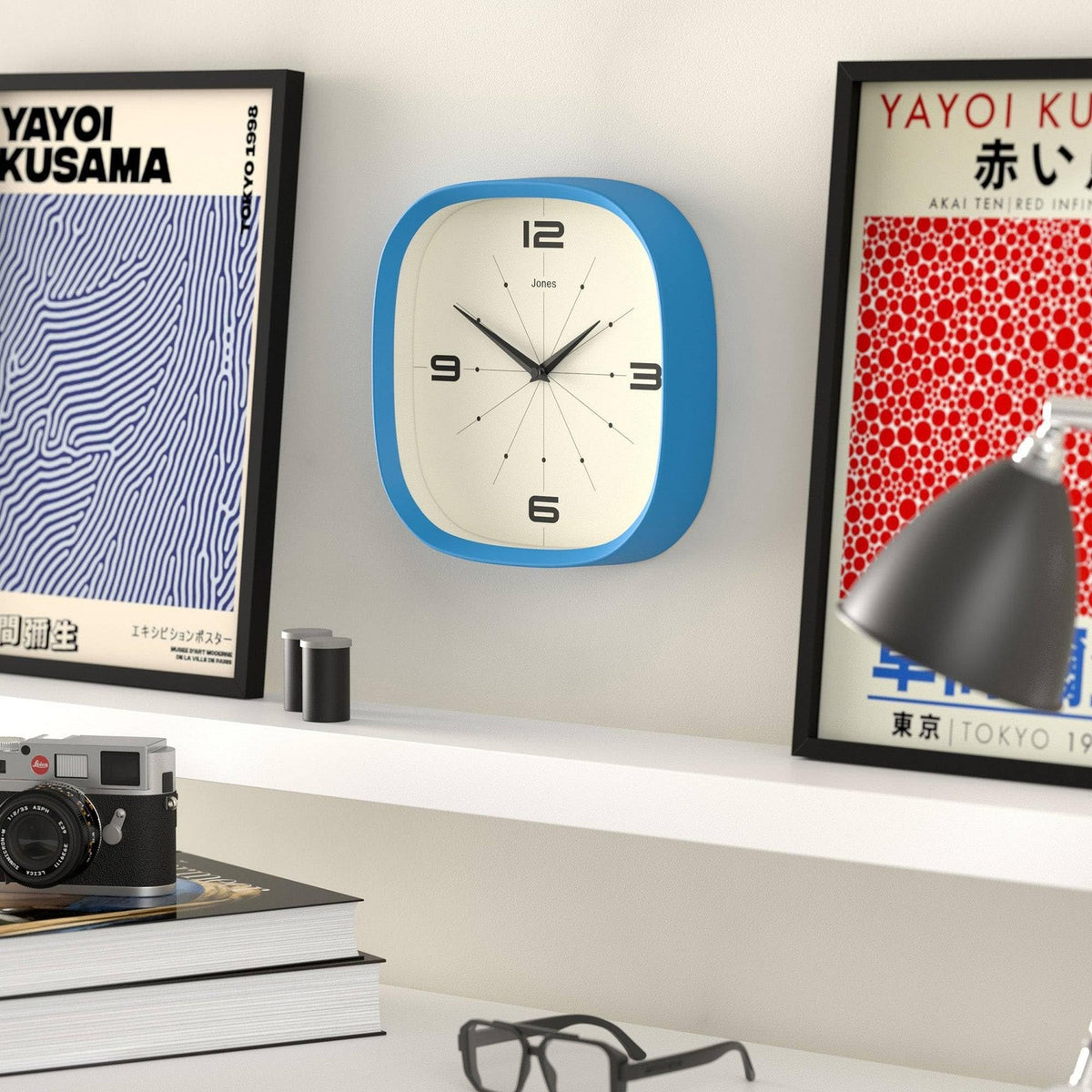Jones Clocks Pulsar wall clock, 10-inch square retro design with rounded edges, blue finish, and modern style.