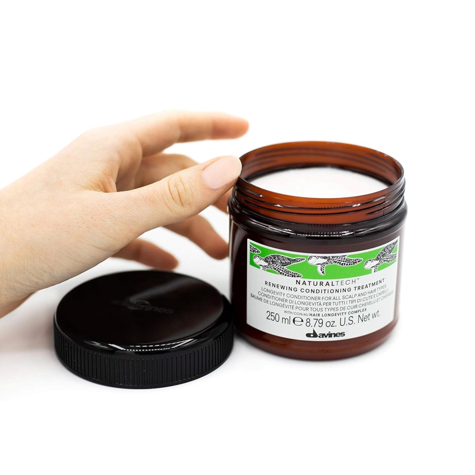 Davines Naturaltech RENEWING Conditioner bottle with label, gentle nourishing and moisturizing hair care product on a white background.