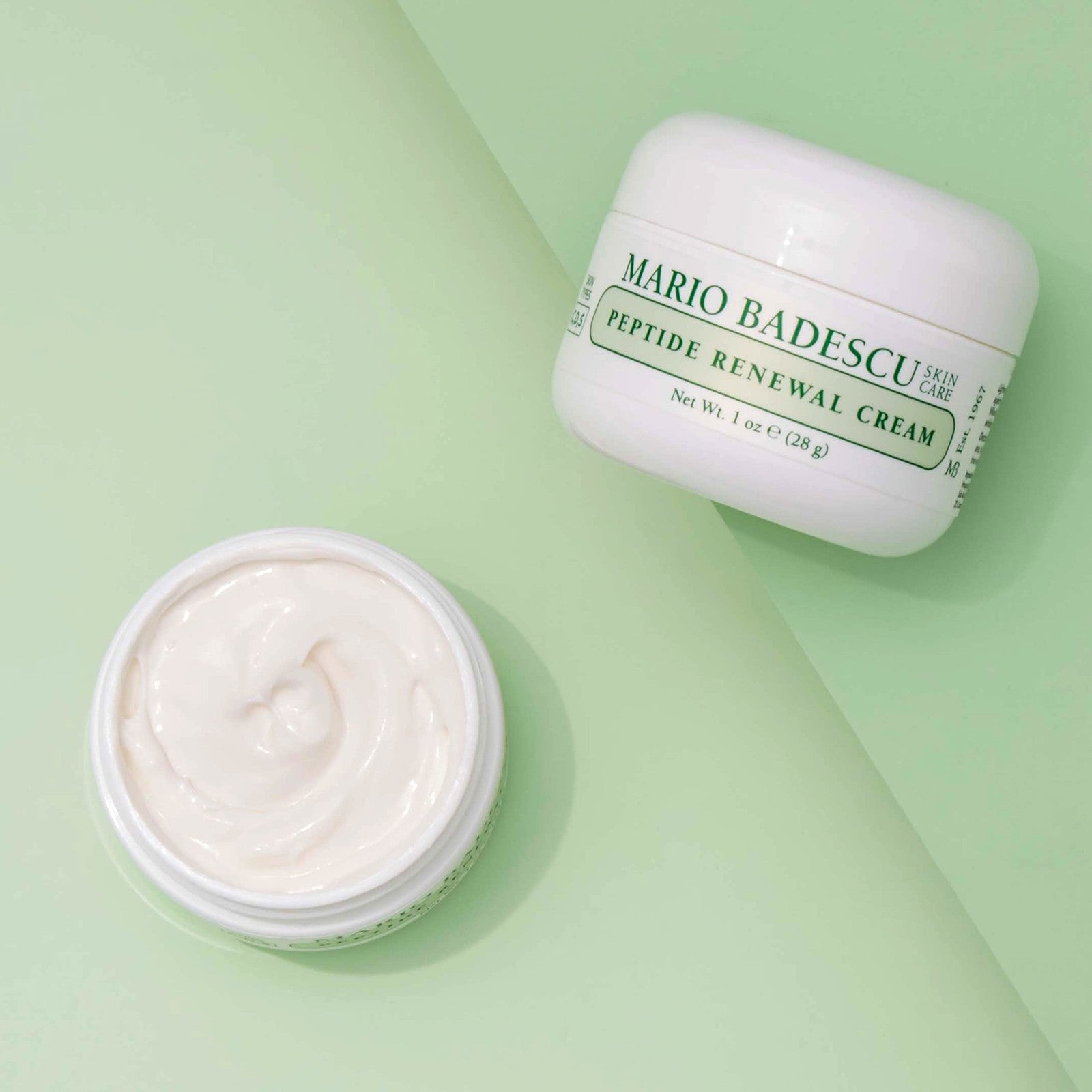 Mario Badescu Peptide Renewal Cream for combination, dry, and sensitive skin, shown in a sleek jar with a white lid and label.